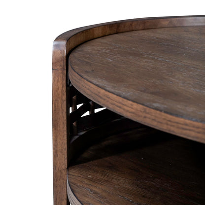 Warren Park - Oval Cocktail Table - Coffee Brown