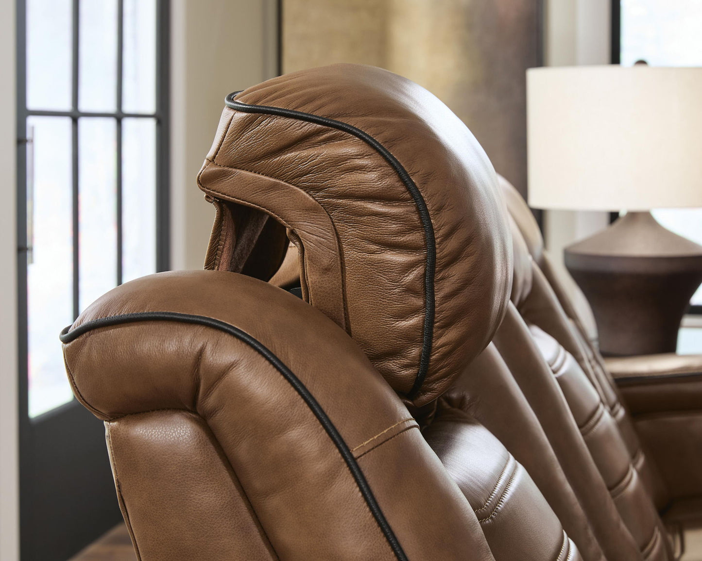 Gruaro - Power Reclining Loveseat With Console / Adjustable Headrest - Amber